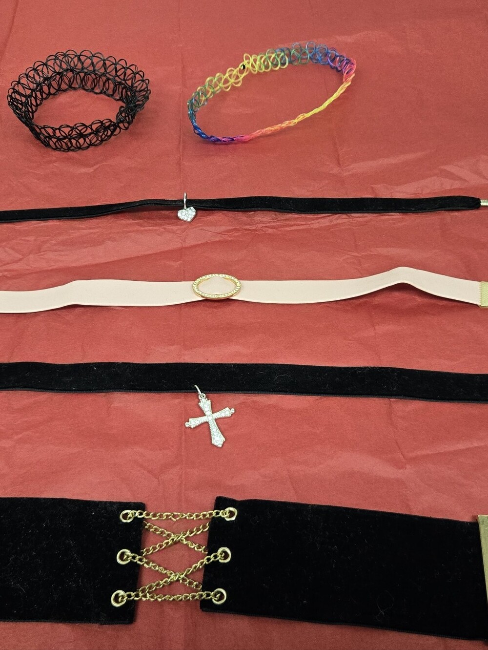 6 Pretty Chokers. 4 Black, 1 Pink And One Multicolored.